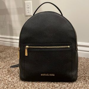 Michael Kors back pack purse, so cute, stylish, light weight,excellent condition